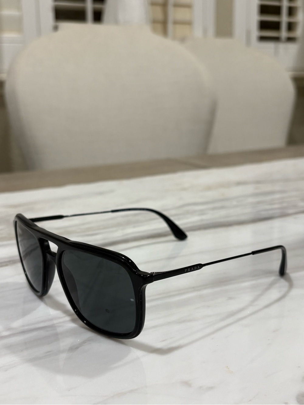 Prada Men's Black Frame Sunglasses with Dark Lenses